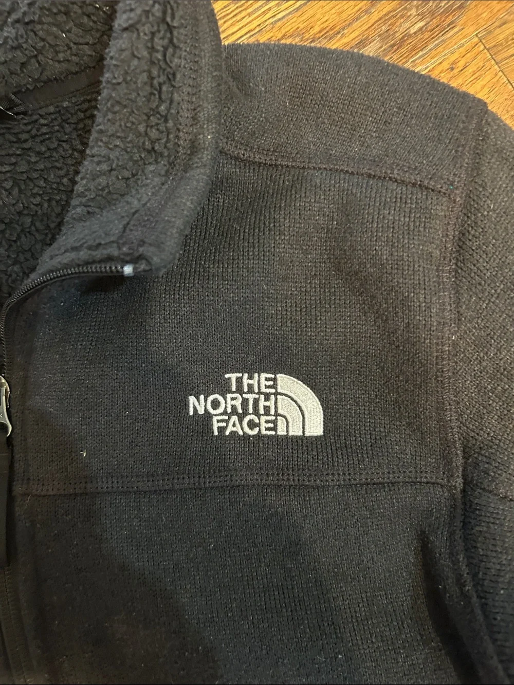 The North Face Black Fleece Zip-Up Jacket with White Logo